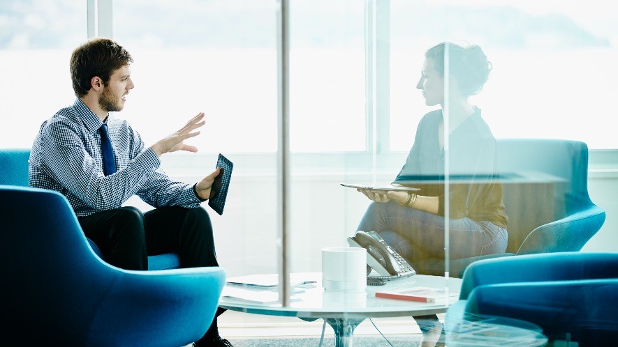 businessman and woman in a discussion