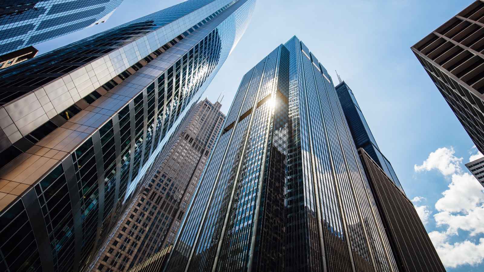 Looking up at high-rise builidngs