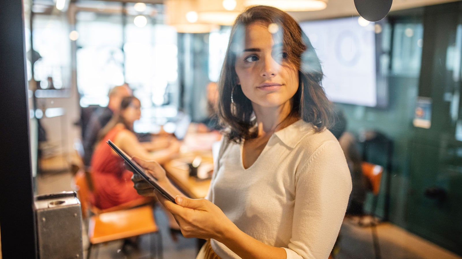 Young businesswoman using digital tablet