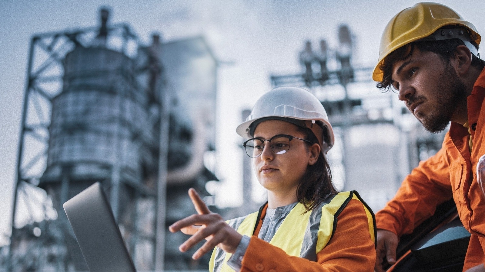 Two workers in the energy sector